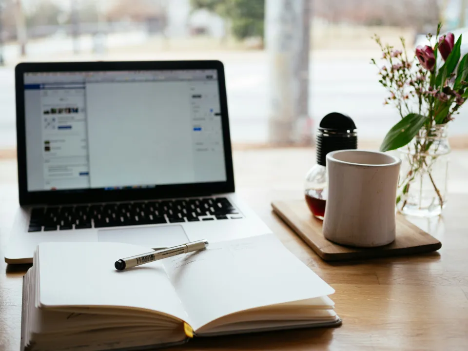 Medical marketing manager preparing blog content and managing social media strategy
