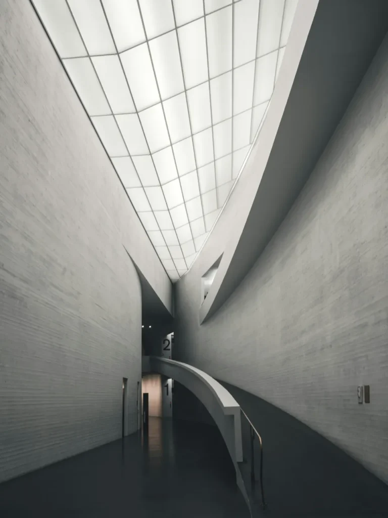 Futuristic hospital interior with minimalist architecture — representing innovation in modern medical facilities