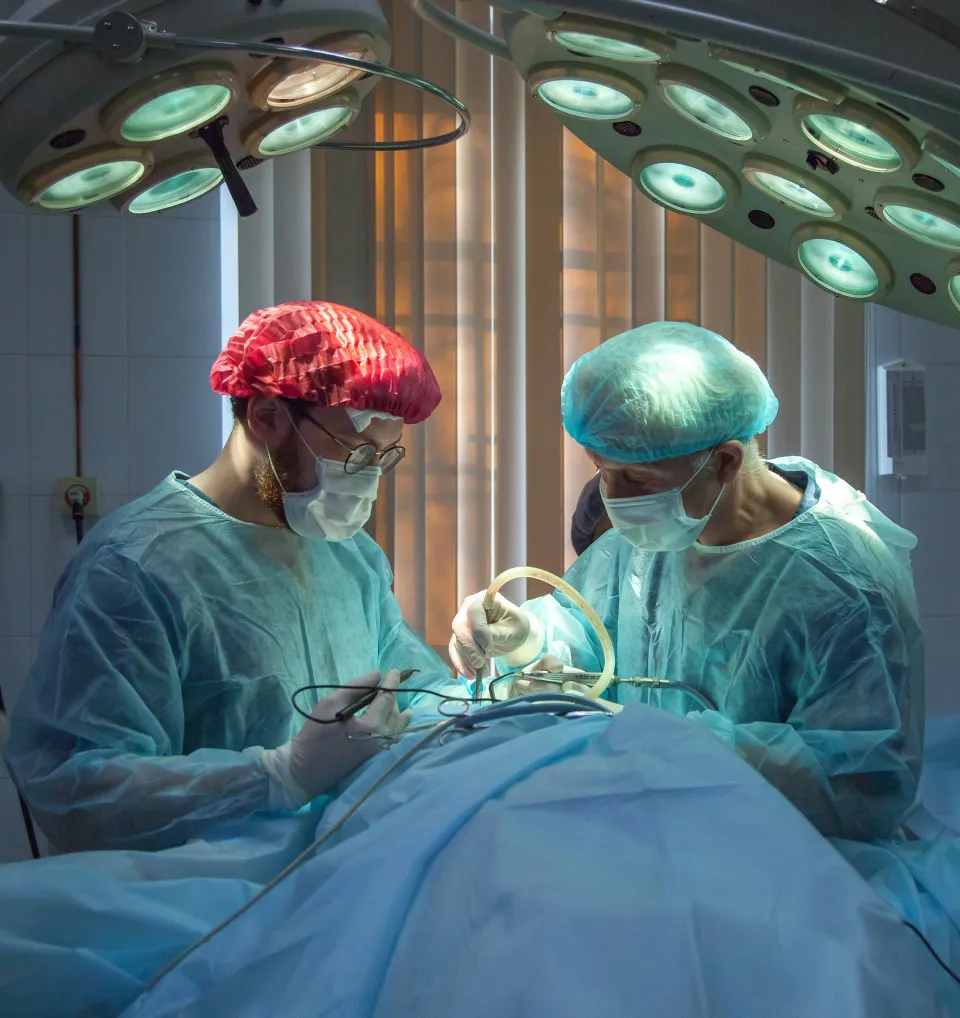 Surgeons performing an operation in a Rhode Island hospital — representing trust in healthcare services